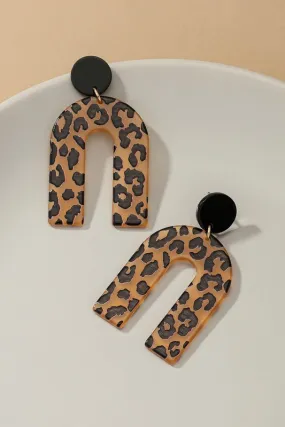 Embossed animal print arch drop earrings